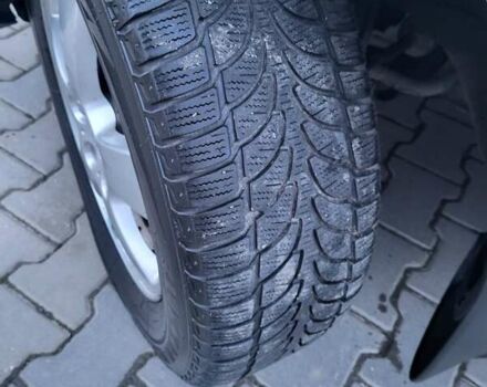 Серый Хендай Туксон, объемом двигателя 2 л и пробегом 240 тыс. км за 8300 $, фото 153 на Automoto.ua