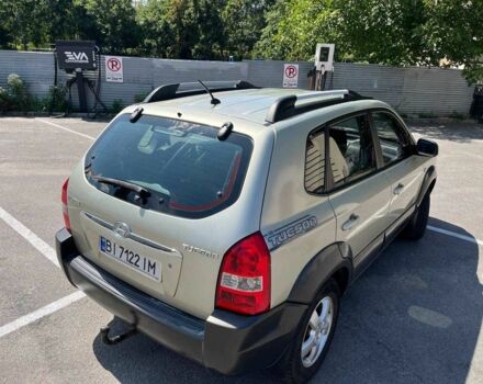 Серый Хендай Туксон, объемом двигателя 2 л и пробегом 265 тыс. км за 7599 $, фото 2 на Automoto.ua