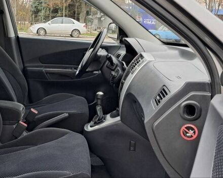 Серый Хендай Туксон, объемом двигателя 2 л и пробегом 95 тыс. км за 8800 $, фото 9 на Automoto.ua