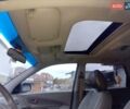 Серый Хендай Туксон, объемом двигателя 1.98 л и пробегом 247 тыс. км за 6200 $, фото 11 на Automoto.ua