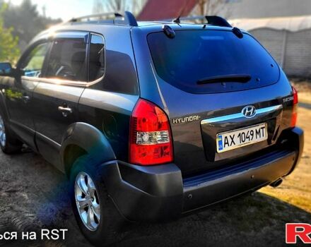 Серый Хендай Туксон, объемом двигателя 2 л и пробегом 190 тыс. км за 8500 $, фото 4 на Automoto.ua