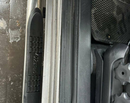 Серый Хендай Туксон, объемом двигателя 1.98 л и пробегом 227 тыс. км за 7700 $, фото 18 на Automoto.ua