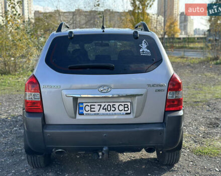 Серый Хендай Туксон, объемом двигателя 1.99 л и пробегом 333 тыс. км за 8199 $, фото 4 на Automoto.ua