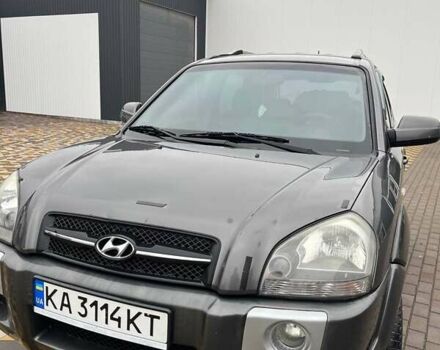 Серый Хендай Туксон, объемом двигателя 1.98 л и пробегом 254 тыс. км за 6900 $, фото 9 на Automoto.ua