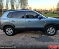 Серый Хендай Туксон, объемом двигателя 2 л и пробегом 220 тыс. км за 8800 $, фото 2 на Automoto.ua