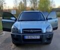 Серый Хендай Туксон, объемом двигателя 2 л и пробегом 220 тыс. км за 8800 $, фото 1 на Automoto.ua