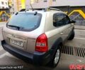 Серый Хендай Туксон, объемом двигателя 2.7 л и пробегом 160 тыс. км за 8900 $, фото 3 на Automoto.ua