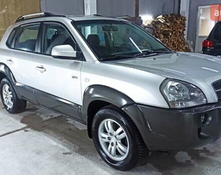 Серый Хендай Туксон, объемом двигателя 2 л и пробегом 127 тыс. км за 9300 $, фото 3 на Automoto.ua