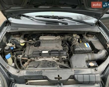 Сірий Хендай Туксон, об'ємом двигуна 1.98 л та пробігом 170 тис. км за 8800 $, фото 27 на Automoto.ua