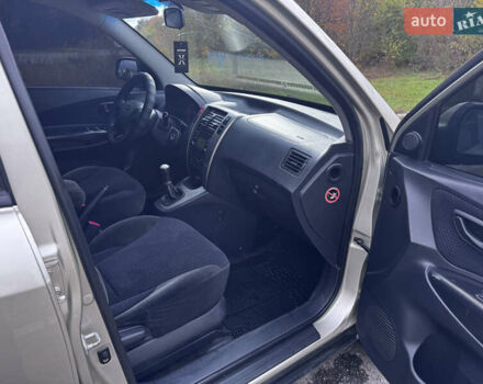 Серый Хендай Туксон, объемом двигателя 2 л и пробегом 228 тыс. км за 6700 $, фото 13 на Automoto.ua