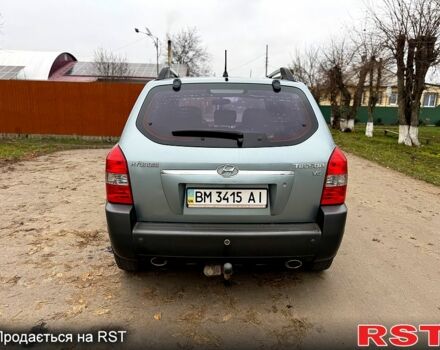 Серый Хендай Туксон, объемом двигателя 2.7 л и пробегом 228 тыс. км за 7650 $, фото 3 на Automoto.ua