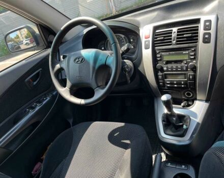 Серый Хендай Туксон, объемом двигателя 2 л и пробегом 265 тыс. км за 7599 $, фото 9 на Automoto.ua