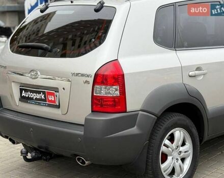 Серый Хендай Туксон, объемом двигателя 2.7 л и пробегом 210 тыс. км за 9290 $, фото 6 на Automoto.ua