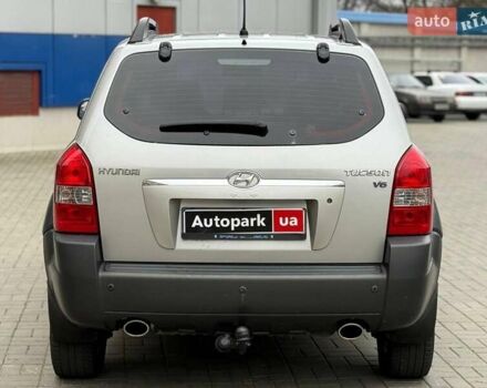 Серый Хендай Туксон, объемом двигателя 2.7 л и пробегом 210 тыс. км за 9290 $, фото 3 на Automoto.ua
