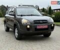 Серый Хендай Туксон, объемом двигателя 2 л и пробегом 187 тыс. км за 7900 $, фото 4 на Automoto.ua