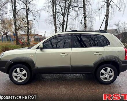 Серый Хендай Туксон, объемом двигателя 20 л и пробегом 170 тыс. км за 7700 $, фото 3 на Automoto.ua