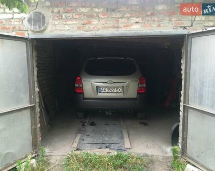 Сірий Хендай Туксон, об'ємом двигуна 1.98 л та пробігом 222 тис. км за 8000 $, фото 26 на Automoto.ua