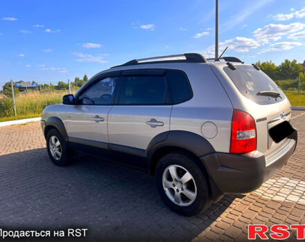 Серый Хендай Туксон, объемом двигателя 2 л и пробегом 285 тыс. км за 8700 $, фото 6 на Automoto.ua