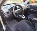 Серый Хендай Туксон, объемом двигателя 1.98 л и пробегом 171 тыс. км за 8400 $, фото 4 на Automoto.ua