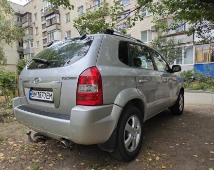 Серый Хендай Туксон, объемом двигателя 2 л и пробегом 170 тыс. км за 3300 $, фото 2 на Automoto.ua