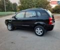 Серый Хендай Туксон, объемом двигателя 1.98 л и пробегом 206 тыс. км за 8600 $, фото 2 на Automoto.ua