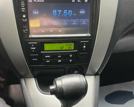 Серый Хендай Туксон, объемом двигателя 1.98 л и пробегом 206 тыс. км за 7550 $, фото 11 на Automoto.ua