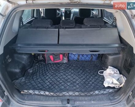 Сірий Хендай Туксон, об'ємом двигуна 1.99 л та пробігом 210 тис. км за 7600 $, фото 6 на Automoto.ua