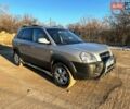 Серый Хендай Туксон, объемом двигателя 1.98 л и пробегом 200 тыс. км за 8800 $, фото 1 на Automoto.ua