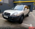 Серый Хендай Туксон, объемом двигателя 2.7 л и пробегом 160 тыс. км за 8900 $, фото 1 на Automoto.ua