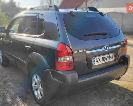 Серый Хендай Туксон, объемом двигателя 1.98 л и пробегом 190 тыс. км за 8500 $, фото 4 на Automoto.ua