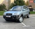 Серый Хендай Туксон, объемом двигателя 2 л и пробегом 48 тыс. км за 11800 $, фото 1 на Automoto.ua