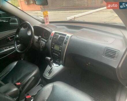 Сірий Хендай Туксон, об'ємом двигуна 1.98 л та пробігом 190 тис. км за 8800 $, фото 8 на Automoto.ua