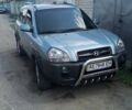 Серый Хендай Туксон, объемом двигателя 2.7 л и пробегом 256 тыс. км за 8700 $, фото 5 на Automoto.ua