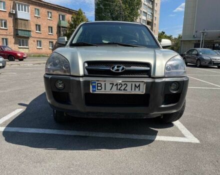 Серый Хендай Туксон, объемом двигателя 2 л и пробегом 265 тыс. км за 7599 $, фото 3 на Automoto.ua