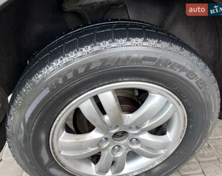 Серый Хендай Туксон, объемом двигателя 2 л и пробегом 198 тыс. км за 8900 $, фото 9 на Automoto.ua