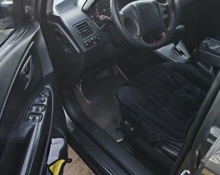 Серый Хендай Туксон, объемом двигателя 2 л и пробегом 197 тыс. км за 8700 $, фото 4 на Automoto.ua