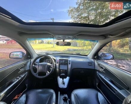 Серый Хендай Туксон, объемом двигателя 1.98 л и пробегом 220 тыс. км за 8500 $, фото 9 на Automoto.ua