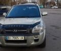 Серый Хендай Туксон, объемом двигателя 1.98 л и пробегом 205 тыс. км за 7600 $, фото 1 на Automoto.ua