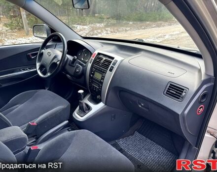 Сірий Хендай Туксон, об'ємом двигуна 2 л та пробігом 178 тис. км за 7900 $, фото 13 на Automoto.ua