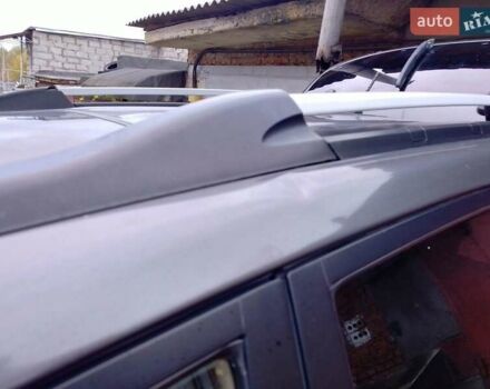 Серый Хендай Туксон, объемом двигателя 1.98 л и пробегом 247 тыс. км за 6200 $, фото 12 на Automoto.ua