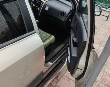 Серый Хендай Туксон, объемом двигателя 2 л и пробегом 190 тыс. км за 9000 $, фото 7 на Automoto.ua