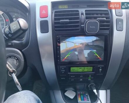 Сірий Хендай Туксон, об'ємом двигуна 1.99 л та пробігом 210 тис. км за 7600 $, фото 15 на Automoto.ua