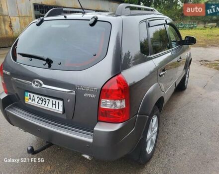 Серый Хендай Туксон, объемом двигателя 1.99 л и пробегом 302 тыс. км за 9300 $, фото 7 на Automoto.ua