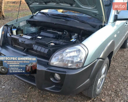 Сірий Хендай Туксон, об'ємом двигуна 2.02 л та пробігом 226 тис. км за 9200 $, фото 18 на Automoto.ua