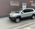Серый Хендай Туксон, объемом двигателя 1.98 л и пробегом 173 тыс. км за 8200 $, фото 2 на Automoto.ua