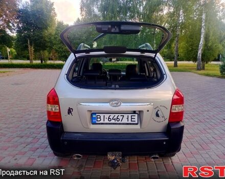 Серый Хендай Туксон, объемом двигателя 2.7 л и пробегом 280 тыс. км за 6500 $, фото 8 на Automoto.ua