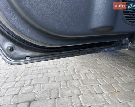 Серый Хендай Туксон, объемом двигателя 2 л и пробегом 198 тыс. км за 8900 $, фото 4 на Automoto.ua