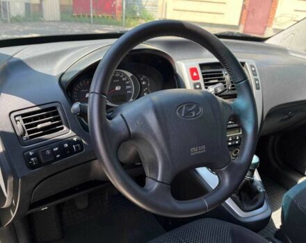 Серый Хендай Туксон, объемом двигателя 2 л и пробегом 265 тыс. км за 7599 $, фото 15 на Automoto.ua