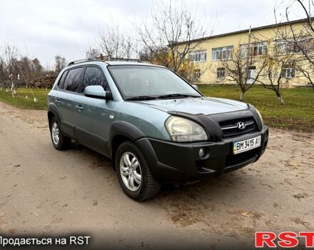 Серый Хендай Туксон, объемом двигателя 2.7 л и пробегом 228 тыс. км за 7650 $, фото 5 на Automoto.ua