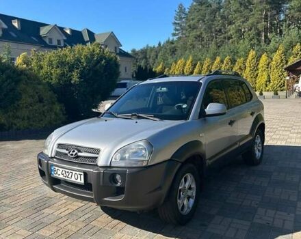 Серый Хендай Туксон, объемом двигателя 1.99 л и пробегом 255 тыс. км за 5800 $, фото 1 на Automoto.ua